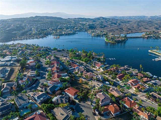 Aerial view of Canyon Lake with waterfront homes surrounding the private lake
