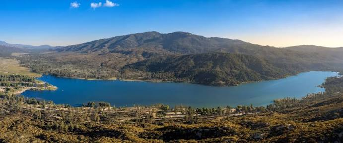 Diamond Valley Lake near Hemet, California, ringed by the San Jacinto mountains under a clear sky