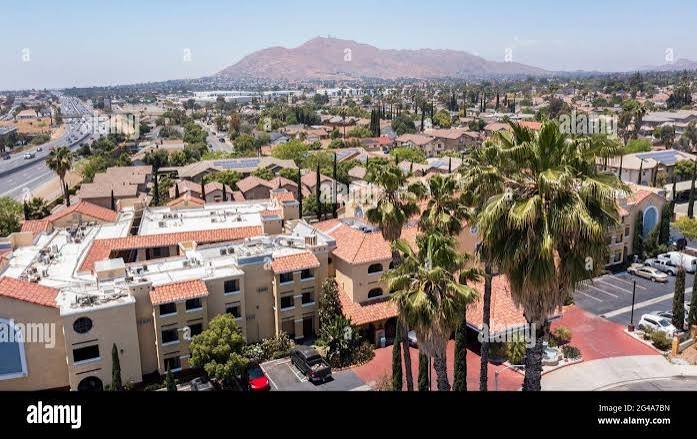 Aerial view of Moreno Valley neighborhoods beneath Box Springs Mountain