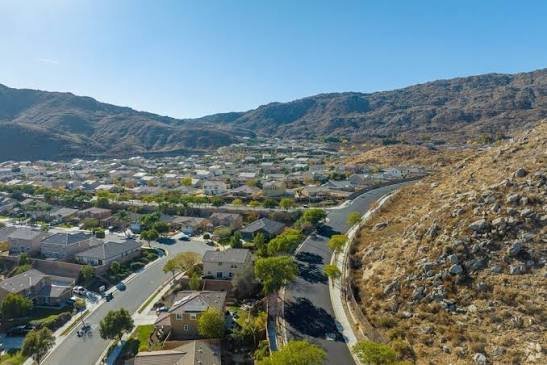 An aerial view of San Jacinto neighborhoods set against the rugged San Jacinto Mountains
