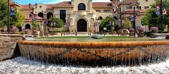 The Town Square fountain in Old Town Temecula with the civic building behind it