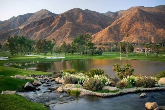A golf course and lake framed by rolling hills near Temecula, California