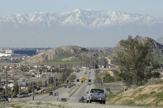 View of Perris, California with snow-capped mountains in the distance