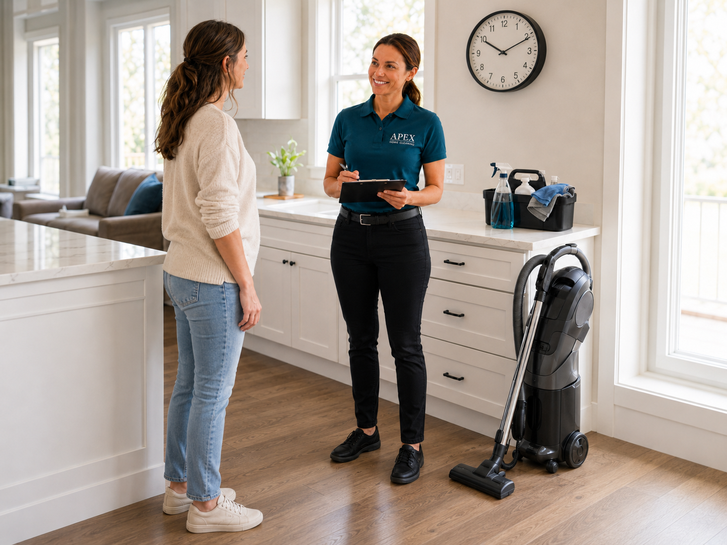 Apex cleaning professional reviewing a residential cleaning plan with a French Valley homeowner in her kitchen
